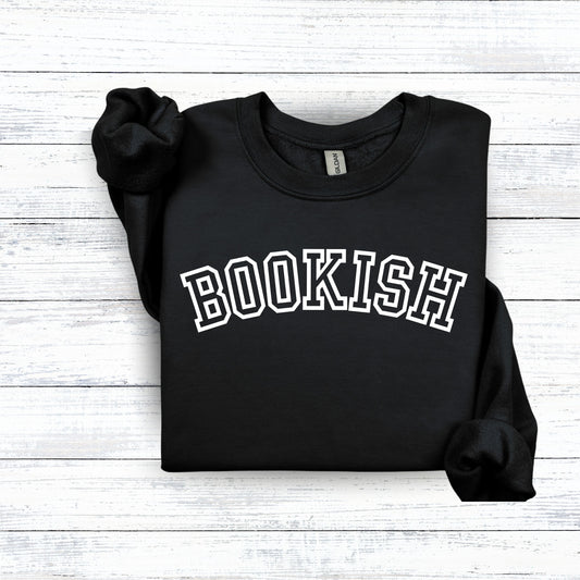 Black sweater with white words in college font that says bookish
