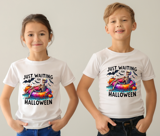 Two children wearing white t-shirts with Halloween-themed graphics and text.