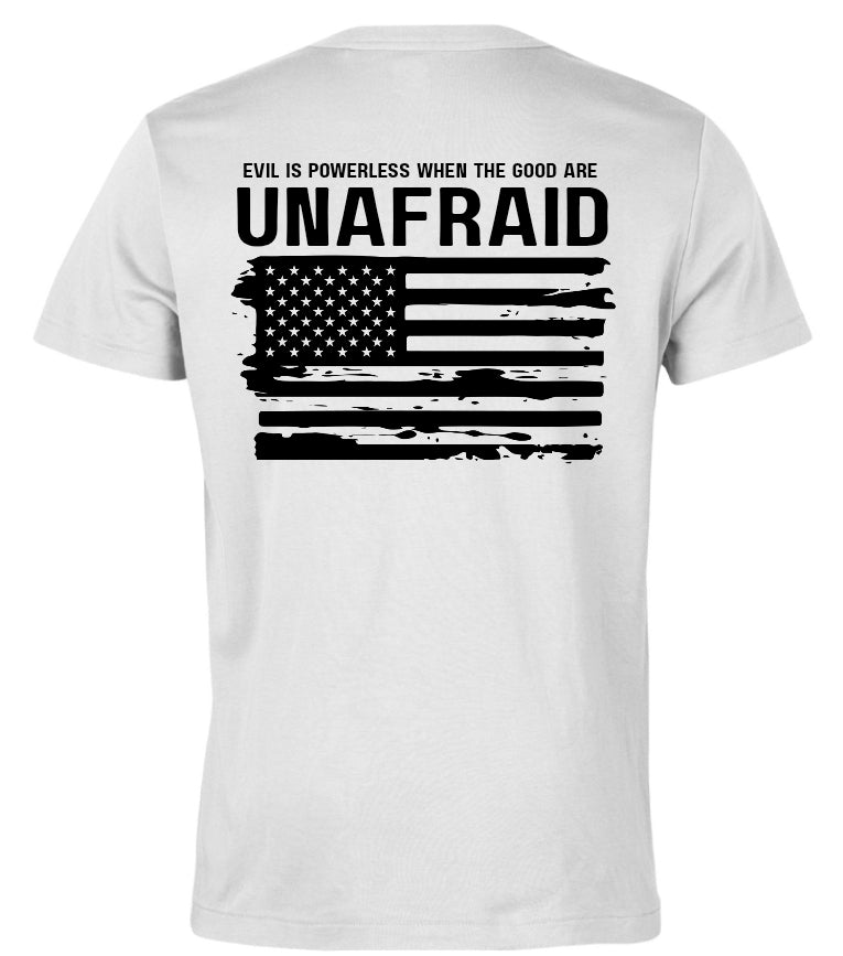 the saying Evil is powerless when the good are unafraid with the image of an American flag slightly tattered. Black writing on a white tee. 