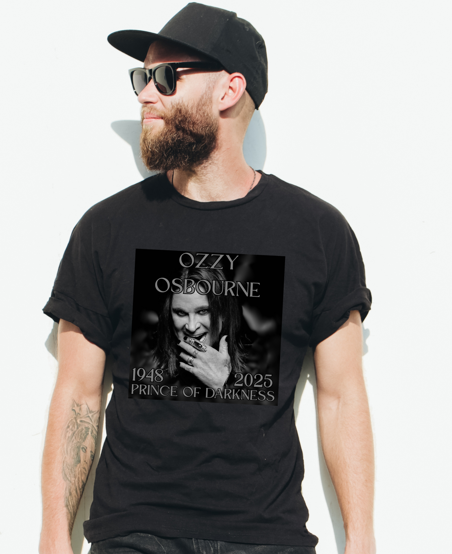 Man wearing a black t-shirt with Ozzy Osbourne graphic and text.